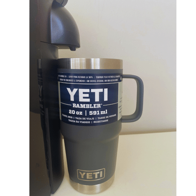 https://whichdrinkware.com/wp-content/uploads/2023/09/which-drinkware-nespresso-compatible-cups-YETI-20oz-rambler-mug-with-vertuo-plus-.png